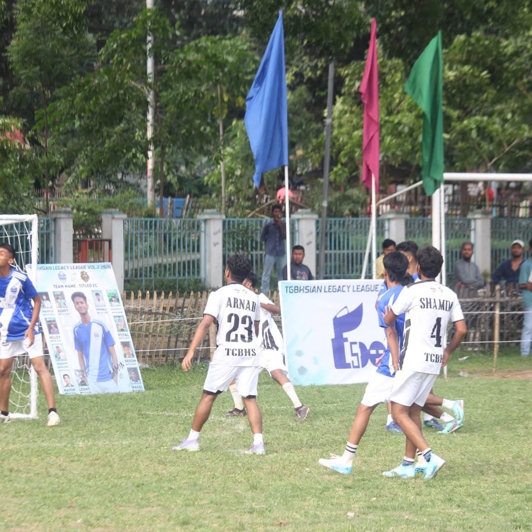 Players in blue-and-white and white Zentra-produced kits contesting the ball near goal during TGBHSian Legacy League Vol. 2