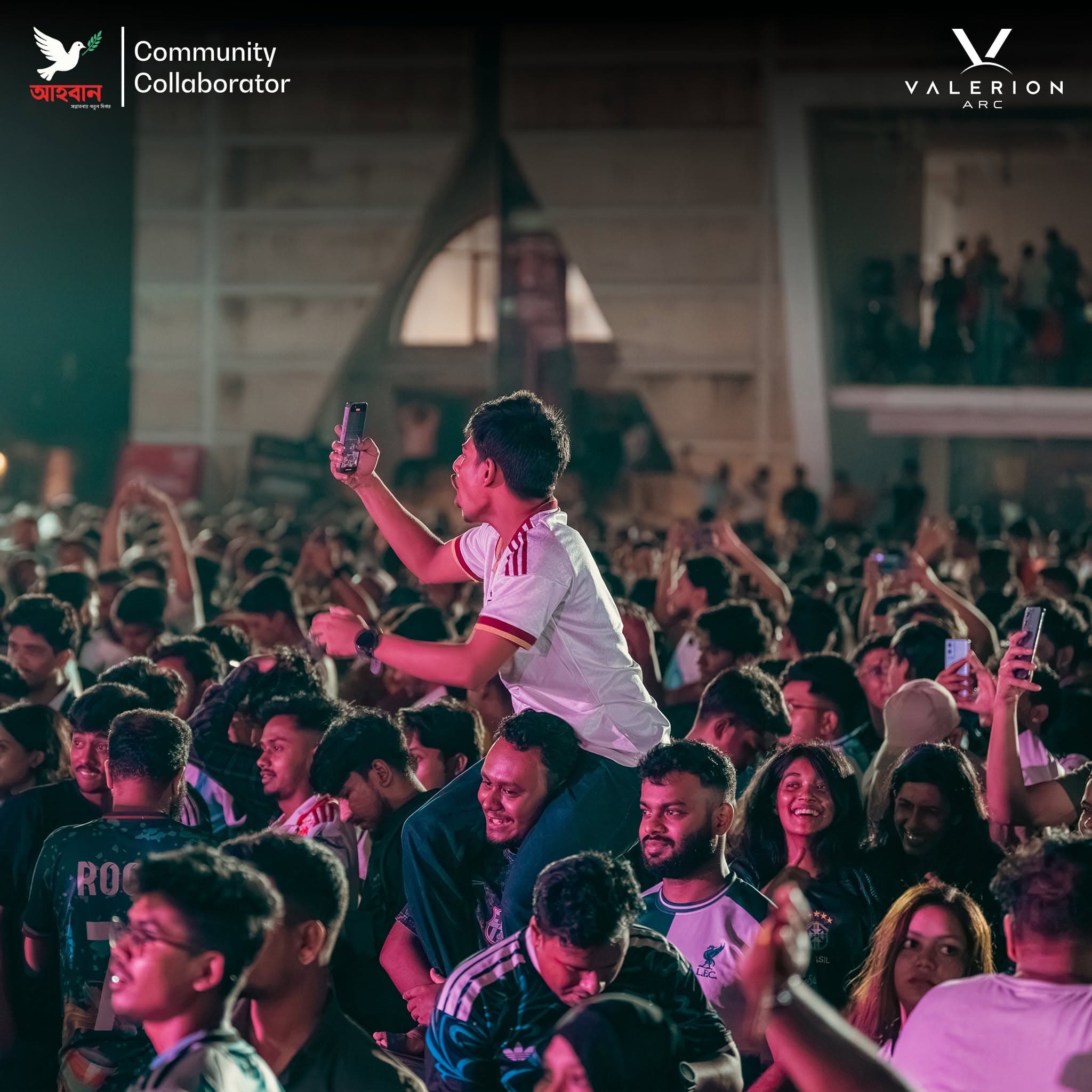 The World Cup Night 2026 crowd celebrating together beneath the Valerion Arc and আহবান marks